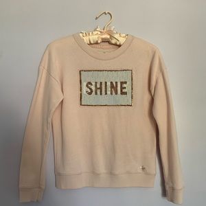 Two-toned Sequin Crewneck. “SHINE/BRIGHT” writing.